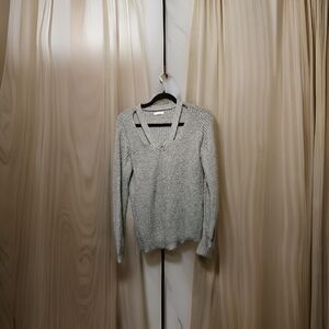 grey sweater. size L